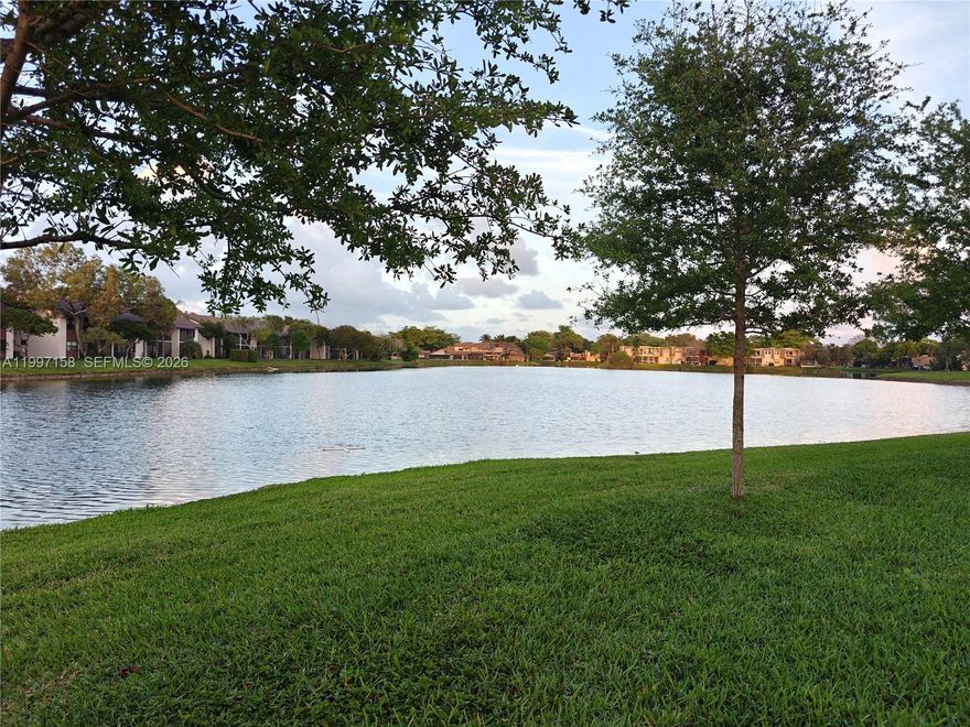 Lake Front 3 Bedroom 2.5 Bath Townhouse With Enclosed Outdoor Patio/Florida Room, 1 Car Garage, 2 car parking spots on driveway and multiple guest parking spots. Townhouse Has A Recently Renovated Kitchen With Stainless Steel Appliances And Granite Countertops. Large Walk in Closet with Drawers and Cabinet. Brand New Gorgeous Porcelain Tiled Bathroom Upstairs And Water Views From Master Bedroom And Bathroom. The Home Has Wood Laminate Floors, Wood Doors Upstairs, And Diamond Style Tile On First Floor. 3 Ton Energy Efficient A/C Ready To Move In. Quiet Neighborhood With Tennis, Pool, And Tons Of Greenery, Clean And Well Maintained Community. Water, Trash, Sewage, Roof, Exterior Painting And All Common Areas Included In The Hoa Fees. Close To Sawgrass Mall Shopping Center.