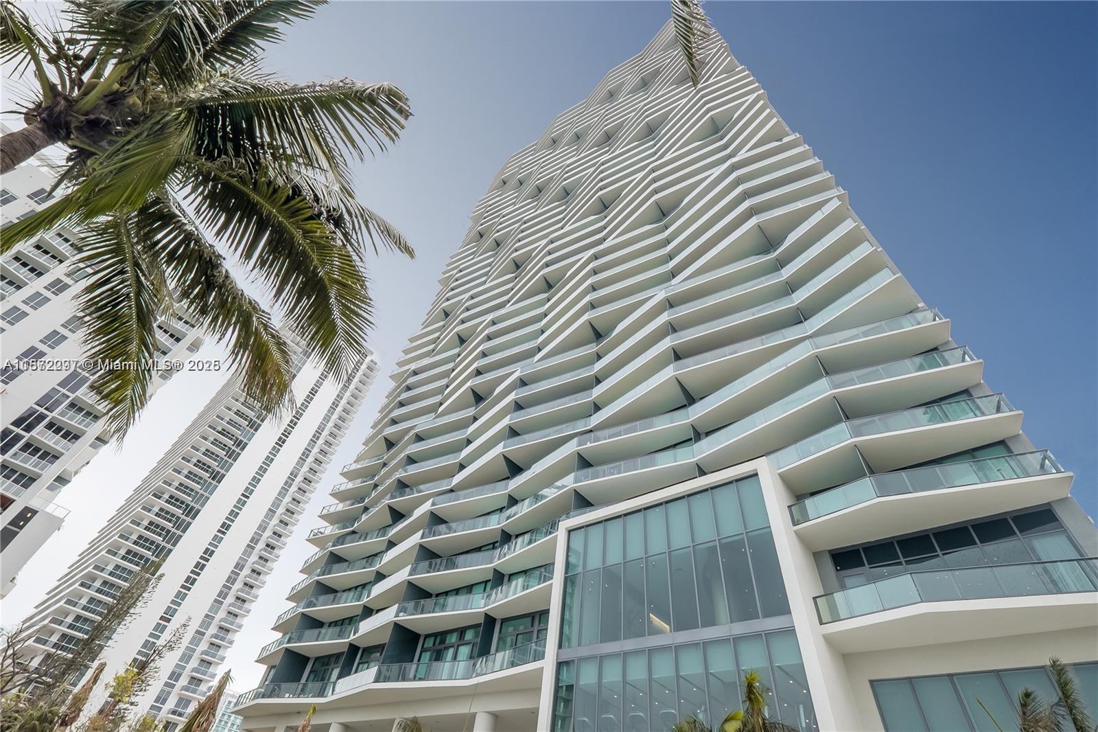 INCREDIBLE ICON BAY IN EDGEWATER'S CONDO. THIS UNIT IS A 2/2 WITH SEE-THROUGH LAYOUT. GREAT FLOORPLAN, WOOD PORCELAIN TILE THROUGHOUT, ALL STAINLESS STEEL APPLIANCES WITH W/D IN UNIT. FLOOR-TO-CEILING WINDOWS WITH UNOBSTRUCTED FABULOUS BAY & CITY VIEWS. WATERFRONT DECK FEATURING ASERENE INFINITY POOL, CLUBROOM WITH MULTIMEDIA FACILITIES, BILLIARDS AND GAME ROOM, WATERFRONTFITNESS CENTER & SPA, TENNIS COURTS, 24 HR VALET, PARK WITH GARDENS AND WALKING PATH, AND MUCH,MUCH MORE.