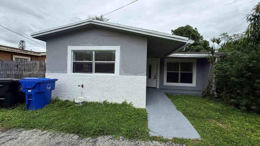 Half of a duplex, 4/2 with large rooms, large kitchen, Laudry room, spare backroom, canal in back. Nice part of North Lauderdale, near to churchs, supermarkets, schools, etc. Central A/C.