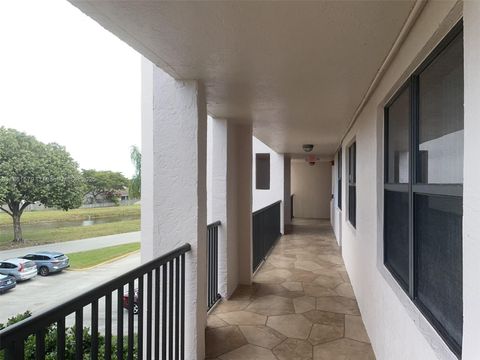 Photo of 10360 NW 30th Ct #303, Sunrise, FL 33322 (MLS # A11861579)