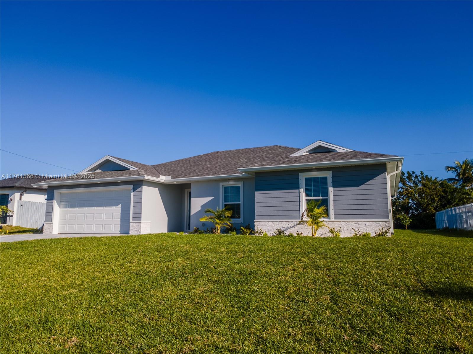 5.99% 30 year fixed-FHA, 3.5% down & 15k towards closing costs w/ full price offer available when using the builders preferred lender! Discover your future dream home with this exceptional New Construction property. This unique floor plan stands out from other spec homes in the area, offering a blend of style, functionality, and comfort that's hard to find. Located in vibrant NW Cape Coral, this home is perfectly situated where the community is rapidly growing. Property is connected to city water and sewer, ensuring convenience and reliability. Also located in an X Flood zone, so no mandatory flood insurance for buyers using a mortgage. This is a fantastic opportunity to secure a beautiful home with financial ease. **Rooms virtually staged **