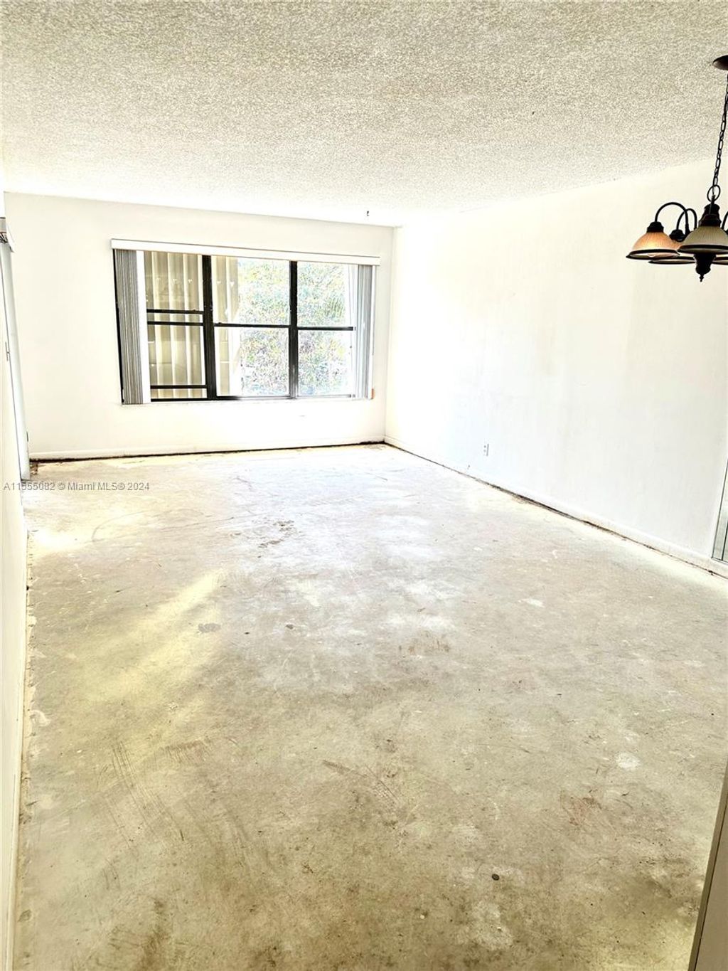 Photo of 2302 S Cypress Bend Dr #306, Pompano Beach, FL 33069 (MLS # A11555082)