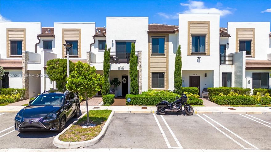 Beautifully upgraded 3-bed, 2.5-bath villa (largest model, 1,667 sf) in the highly desirable Via Ventura community. This home stands out with custom designer landscaping that elevates its curb appeal, with elegant wood floors on the second level and staircase, and a modern double glass door separating the living & dining areas from the spacious open kitchen. The oversized kitchen offers plenty of room for a breakfast area & a cozy family space overlooking the large patio, ideal for gatherings or simply relaxing. Additional upgrades include impact windows and doors, brand-new A/C, & water heater. The community has a very low HOA and resort-style amenities, including a pool, gym, banquet hall & beautiful walking areas. A must-see property that combines comfort, style, and value.