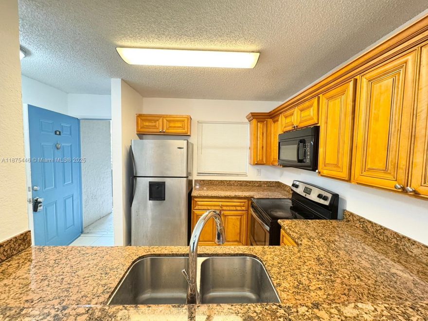 BEAUTIFUL 2 BED 2 BATH CONDO IN WEST PALM BEACH. GRANITE COUNTER TOPS AND TILE FLOORING THROUGHOUT THE MAIN LIVING AREA LAMINATED FLOOR IN THE ROOMS. REALLY BRIGHT & SPACIOUS UNIT W/ WASHER AND DRYER.