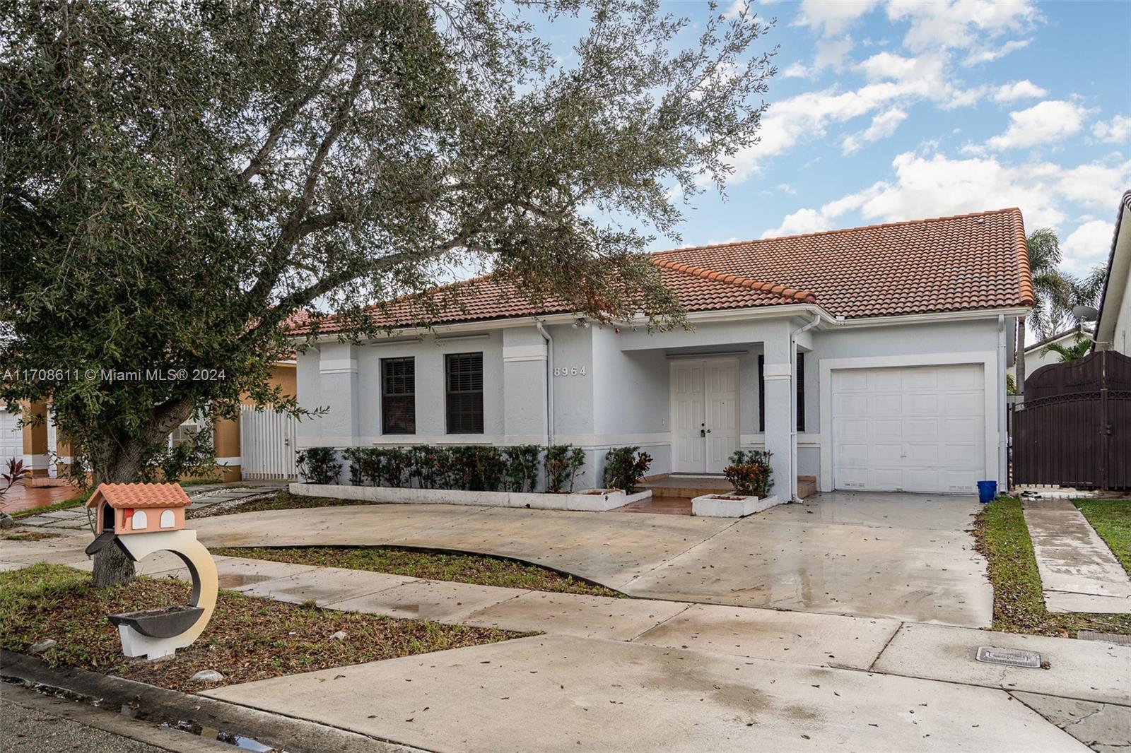 8964 Nw 146th Ter, Miami Lakes, Miami-Dade County, Florida - 4 Bedrooms  
2 Bathrooms - 