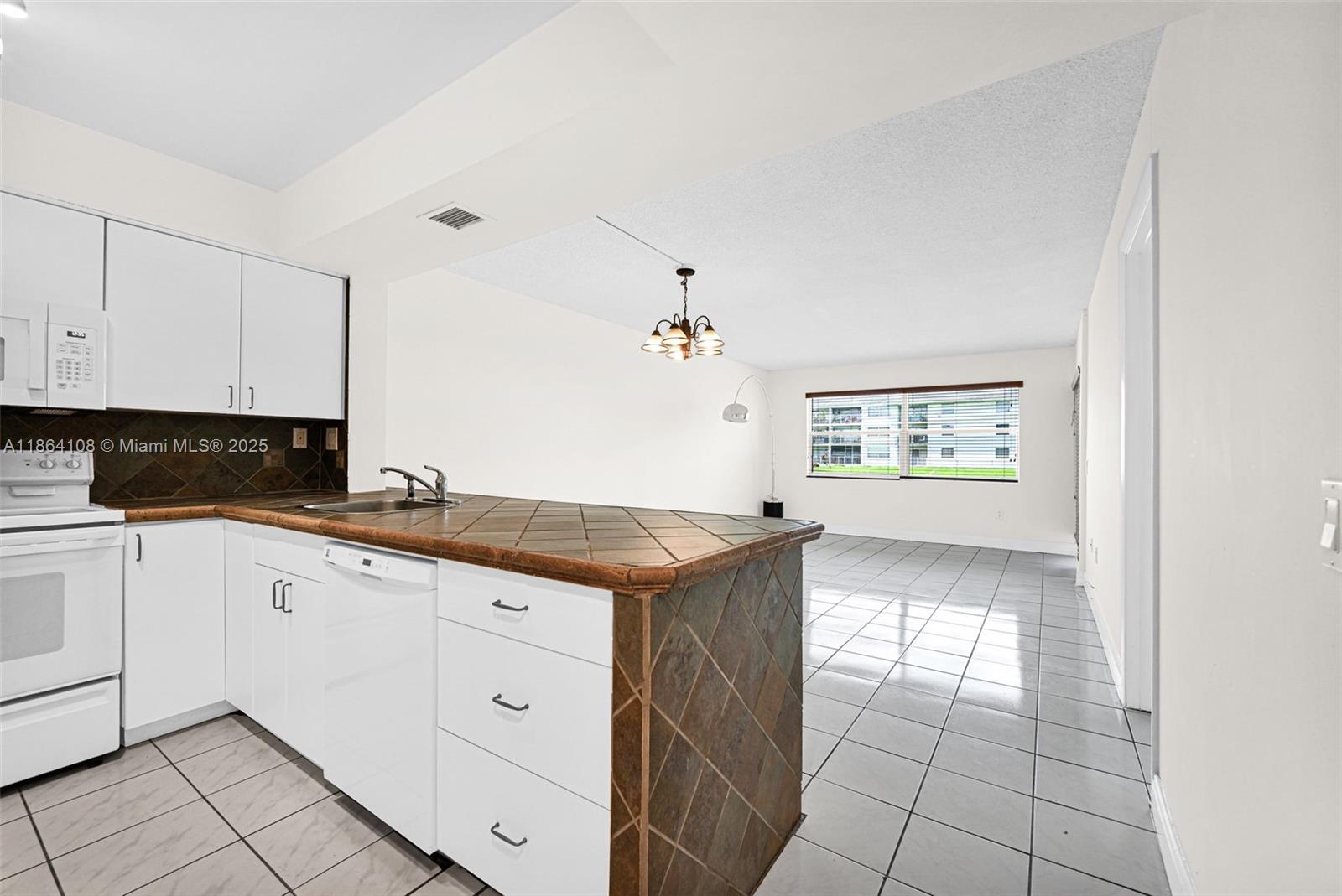 LAKE & TENNIS VILLAS PH 1 - Residential