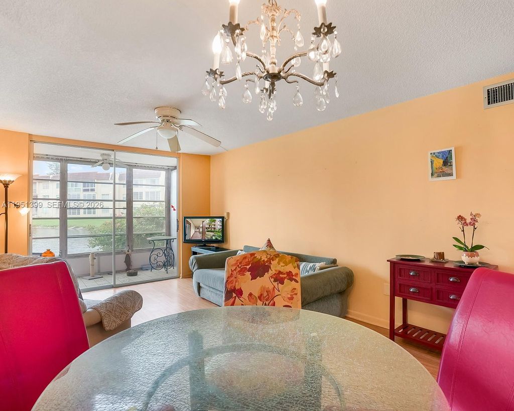 Photo of 8861 Sunrise Lakes Blvd #106, Sunrise, FL 33322 (MLS # A11951399)