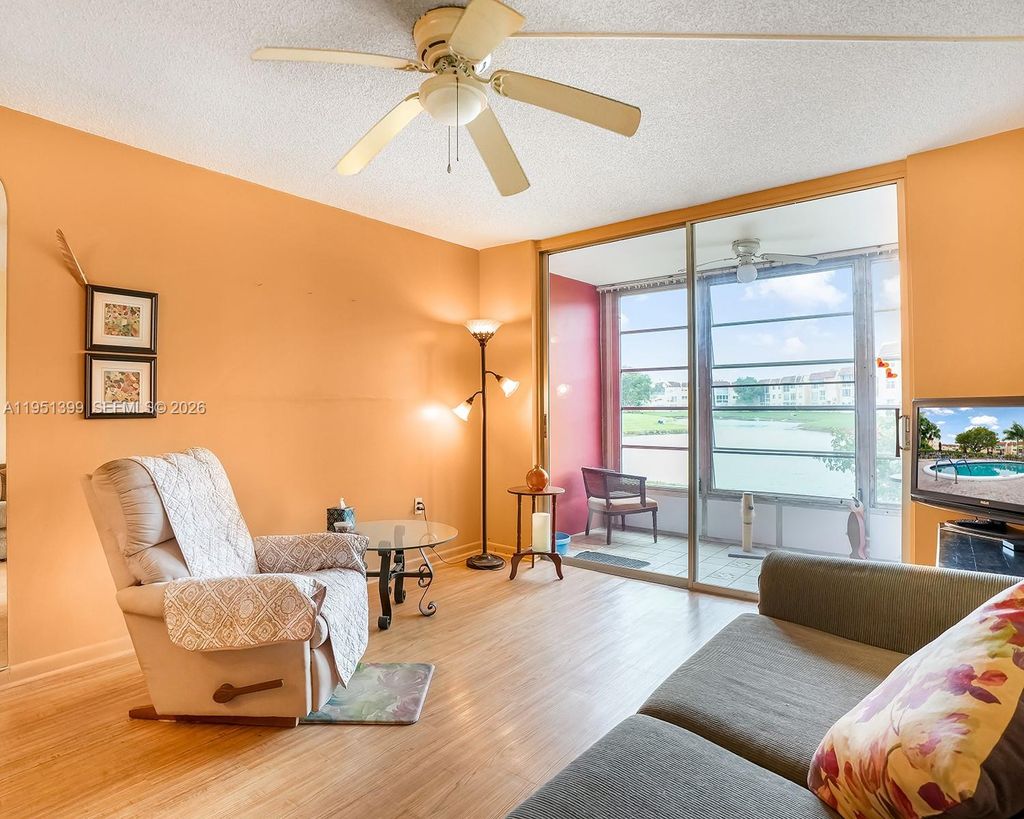 Photo of 8861 Sunrise Lakes Blvd #106, Sunrise, FL 33322 (MLS # A11951399)