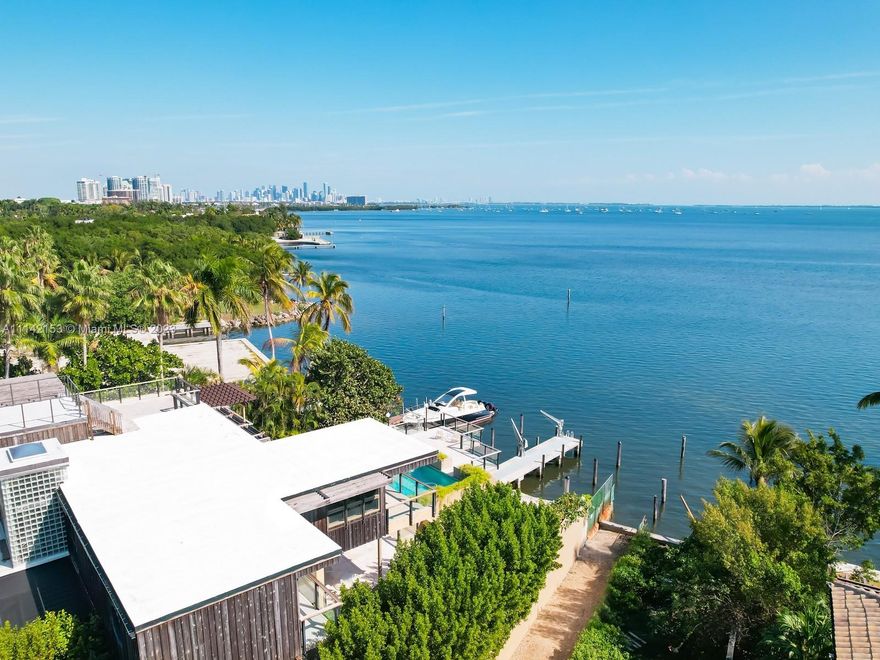Total Area SqFt: 12,707 | Adjusted SqFt: 8,478 | Lot SqFt: 16,334 | Living Area SqFt: 5,963.
Has a spectacular wide view to the bay. The main level is approximately 17 feet above sea level which creates some of Miami's best views for a single family home.

Multi level living space with breathtaking ocean view, bay and vibrant city horizon.

One of Coconut Grove’s most charming streets leading up to the private home which includes 4 bedrooms plus 2 offices and 5 1/2 baths; great open room concept; stunning entertainment deck that allows great indoor outdoor private events; new dock that can handle up to a 30 foot boat; and air conditioned 6 car garage.

Live the very special Coconut Grove lifestyle on Biscayne Bay.