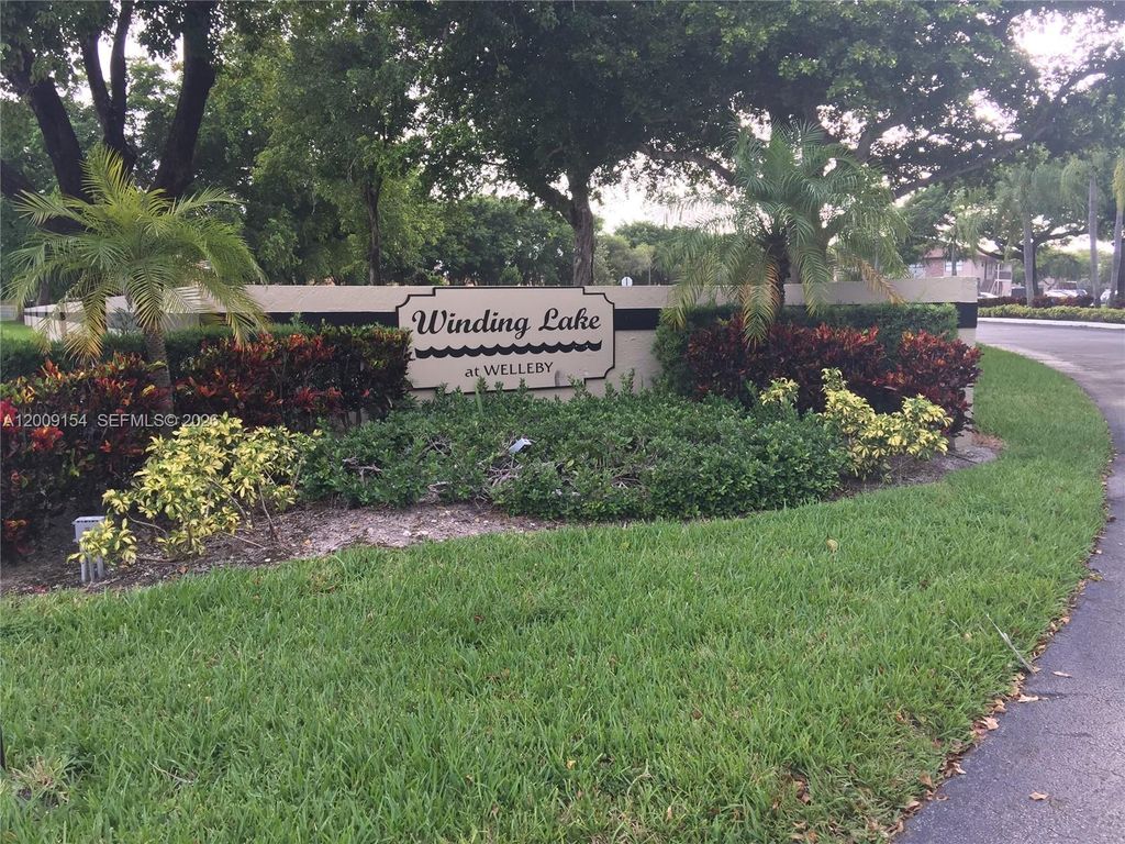 Photo of 10016 Winding Lake Rd #202, Sunrise, FL 33351 (MLS # A12009154)