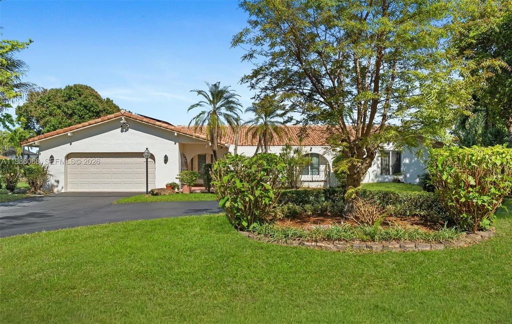 Photo of 11101 NW 26th Dr, Coral Springs, FL 33065 (MLS # A11986068)