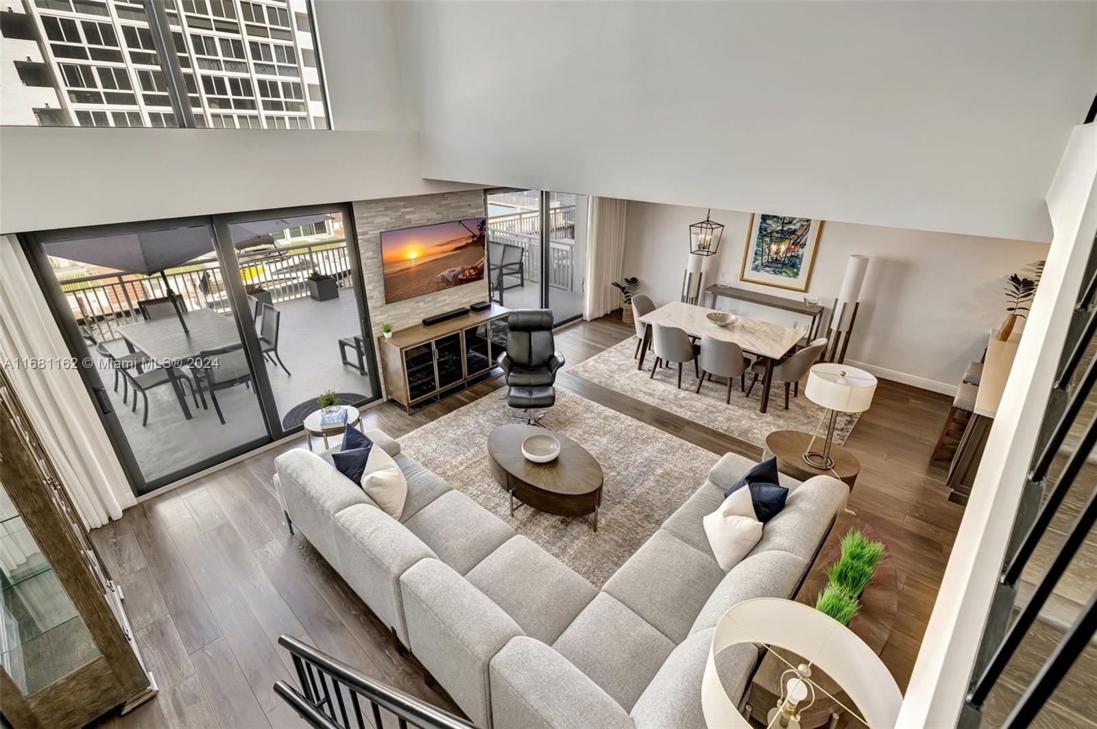 Experience waterfront luxury in Coral Ridge Country Club Estates! This 2-story townhome at Pilot House offers 3 en-suite bedrooms, soaring ceilings, rich hardwood floors, an open kitchen floorplan, and a spa-inspired primary bath w/ steam shower. A sprawling balcony provides captivating water views, with dockage at $6.50/ft and direct Intracoastal access. Pet-friendly building. Per association: No SIRS related increases in 2025 and no proposed special assessments. A new roof underway, and 40-year certification complete. Amenities include a heated Intracoastal pool, gym, & 2 garage spaces. Golf, restaurants, and the sands of the Atlantic minutes away!