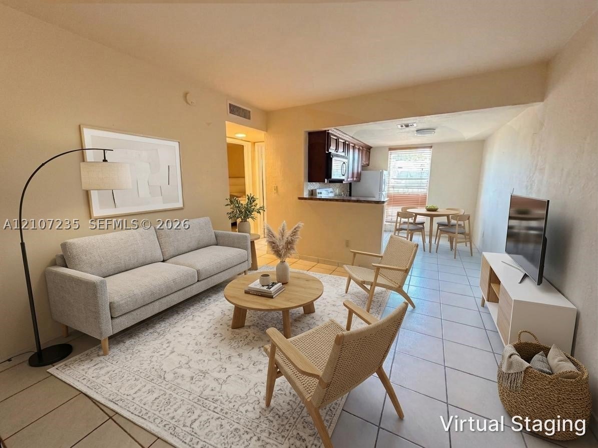 241 S Royal Poinciana Blvd 205