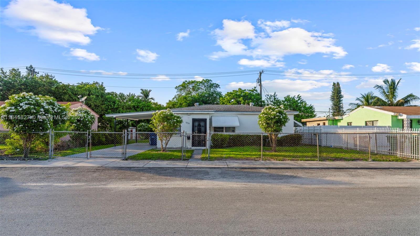 Move-in ready 3-bedroom, 1-bath home with 1,024 sq ft of comfortable living space on an oversized 7,020 sq ft lot. The updated kitchen features granite countertops and modern finishes. Enjoy plenty of parking with an attached carport, driveway, and abundant street parking. The spacious backyard offers endless potential — ideal for adding a pool, creating a lush garden, or hosting gatherings. Located on a quiet residential street with easy access to major roads, schools, and shops. Whether you're a first-time homebuyer or an investor, this property checks all the boxes!