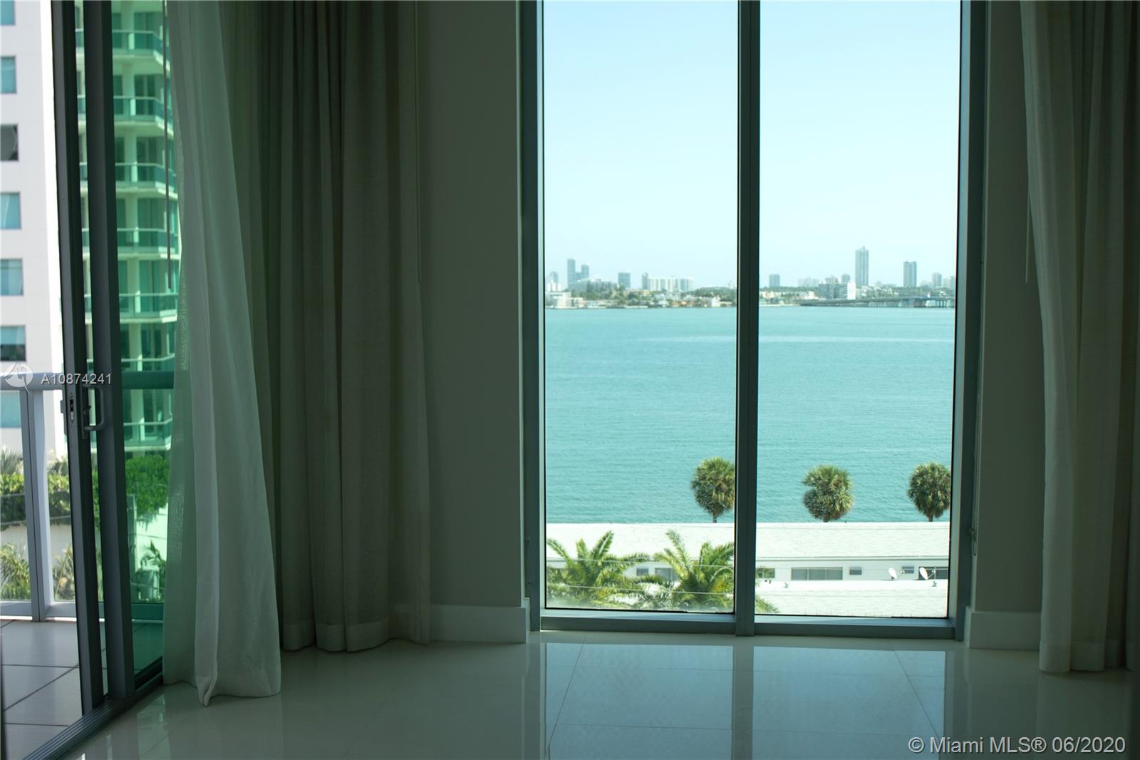 ELOQUENCE ON THE BAY COND - Residential Lease