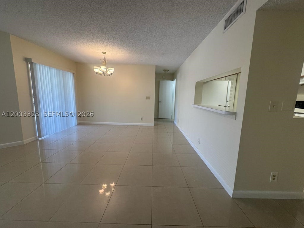 Photo of 9833 Westview Dr #824, Coral Springs, FL 33076 (MLS # A12003328)