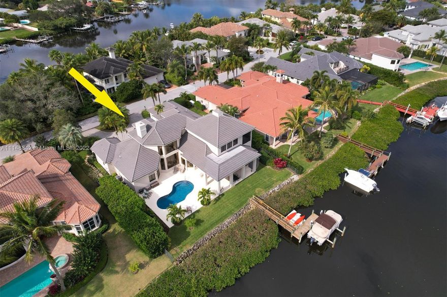 This magnificent custom-built home is ideally located in the elegant, gated community of the Islands of Jupiter.  It is nestled on the NW fork of the Loxahatchee River just south of Jonathan Dickinson Park.  This location offers a quiet natural setting with easy access to the Intracoastal, Ocean & famous Jupiter Inlet & sandbar.
Built in 2003, 5 BR 5 BTH 1 HLF BTH with 5797 square feet & 3 car garage.  You will enjoy 2 Primary BR, one up & one down.  Enjoy popular home features & first-class amenities throughout.  Recent improvements include exterior painted 2021, Pool /deck 2021, 4 new A/Cs, 75-gallon hot water heater 2022, gas fireplace, new pool heater, residential addition with screened-in lanai 2015, tiled 3 car garage, rip rap seawall & dock 2017, lush landscaping & walkways + more!