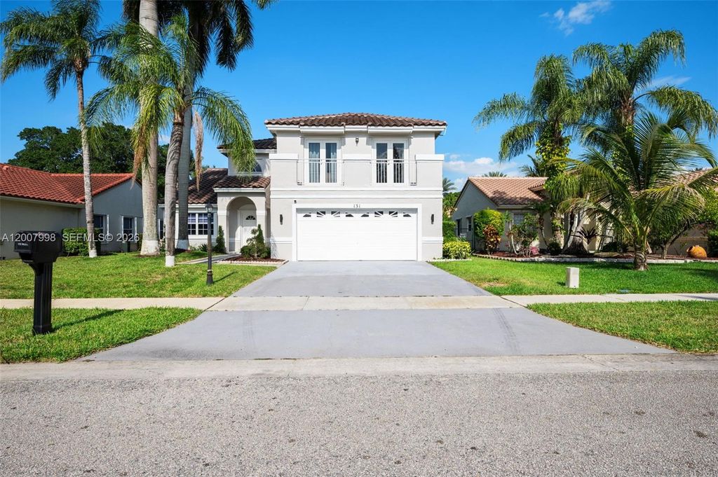 Photo of 131 NW 187th Ave, Pembroke Pines, FL 33029 (MLS # A12007998)