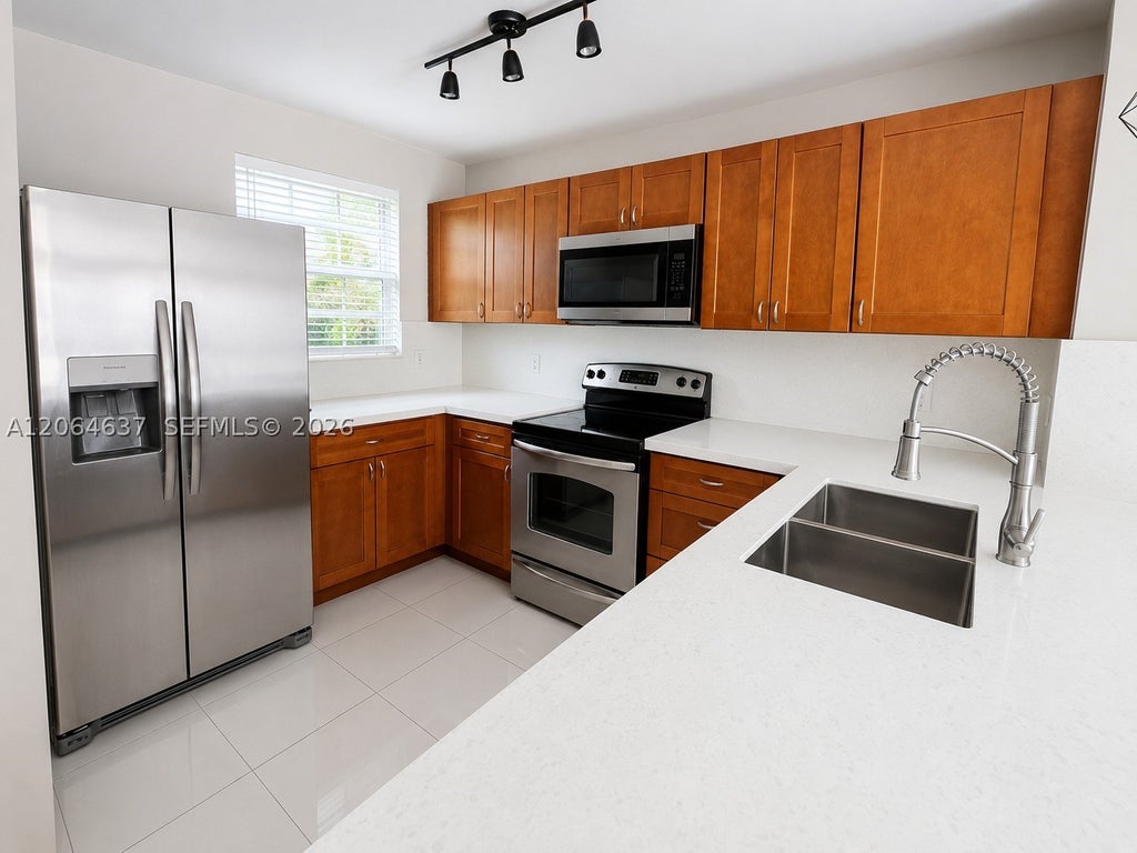 Photo of 8201 Fairway Rd #8201, Sunrise, FL 33351 (MLS # A12064637)