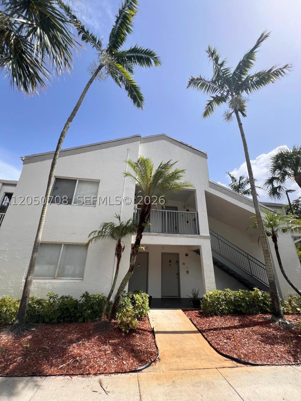 Photo of 5646 Rock Island Rd #205, Tamarac, FL 33319 (MLS # A12050708)