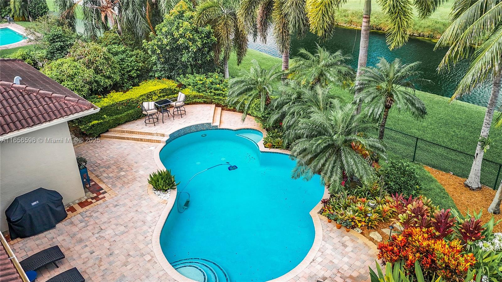 Just reduced! Great opportunity to purchase a waterfront home in the family-friendly, gated enclave of Flamingo Gardens in Palmetto Bay. The 4 bedroom, 4 bathroom plus den/office has a spacious floorplan and a warm coastal feel. This executive home provides plenty of entertainment space, including a tropical oasis in the backyard with a pool that has both a salt system and heater. Full-impact windows and doors provide for safety and lots of natural light. The large primary suite includes two walk-in closets and a beautiful, oversized bathroom. Additionally, two newer HVACs and a Sonos system will provide comfort and enjoyment. A gorgeous paver driveway also allows for 10 cars for large gatherings. The very best public and private schools are all nearby.
