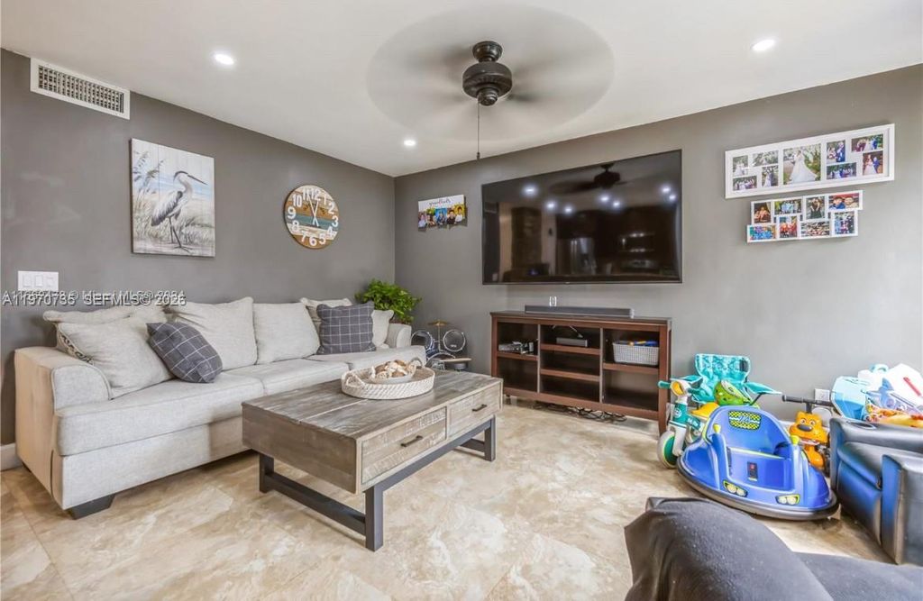 Photo of 11208 NW 15th St, Pembroke Pines, FL 33026 (MLS # A11970735)