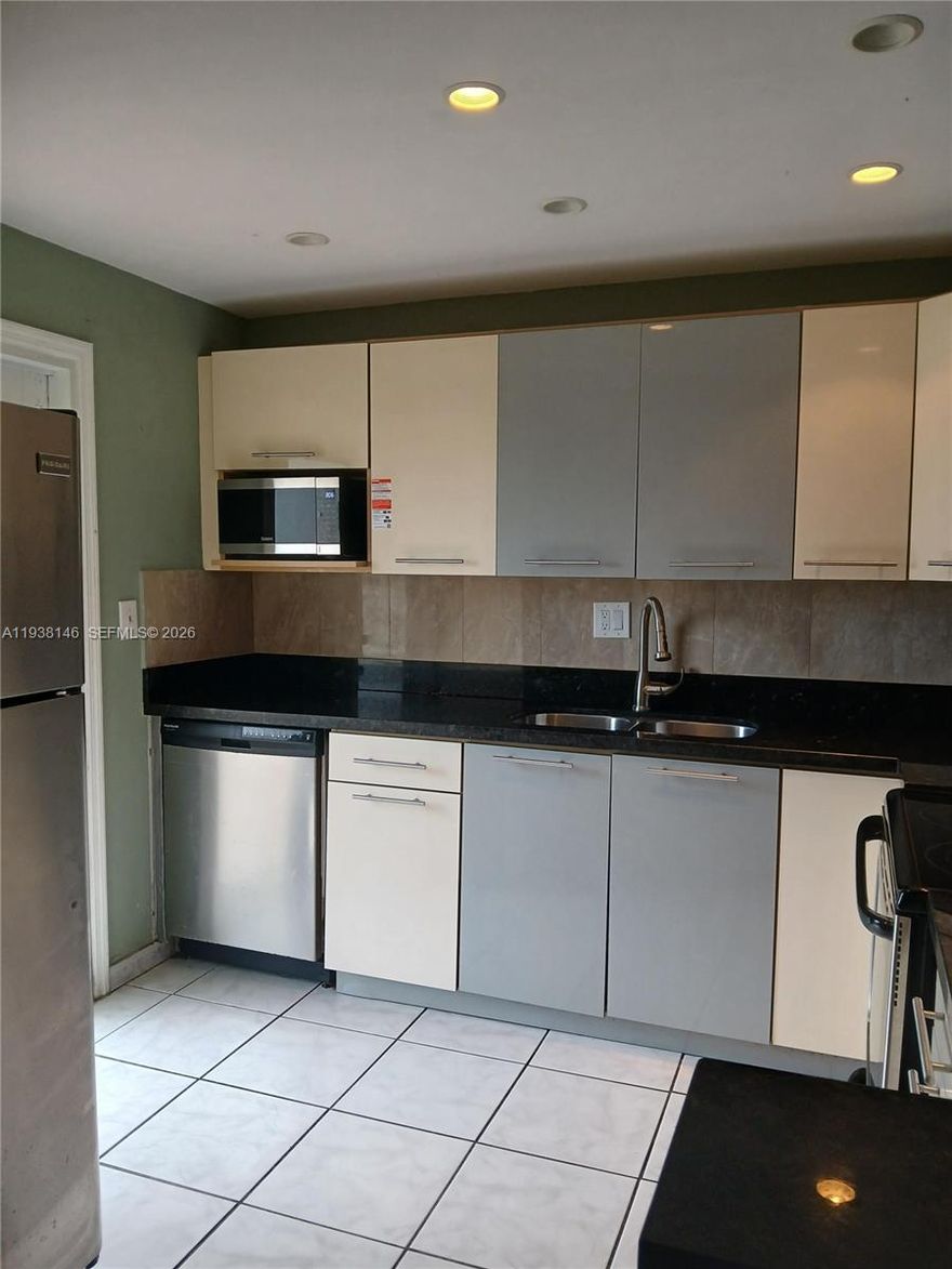 Enjoy easy 55+ living in the desirable Water Bridge community in the heart of Sunrise. This 2BR/2BA, 1,030 Sf. on the first floor, features HURRICANE-IMPACT WINDOWS & DOORS for peace of mind, quiet, and energy efficiency. The unit has an open kitchen with granite and Italian Style Cabinets, bright huge dining/living room, private screened balcony perfect for morning coffee.  Laundry room and assigned parking. Community amenities include a clubhouse, pool, library, BBQ area, shuffleboard, and elevators. Low HOA fee includes water and common-area maintenance. Prime location close to shopping, dining, and major highways. Easy to show!