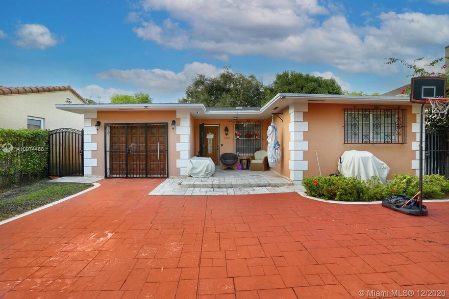 Lovely gated home on a quiet tree-lined street - just minutes to Coconut Grove, Coral Gables, MIA, Downtown, Key Biscayne & the Beaches. Light-filled living spaces with 4BR/3BA  (including 2 master suites) and tile flooring throughout. Expansive and private backyard with deck & terrace is canopied by large oak tree - ideal for year-round outdoor living & entertaining. 6900 SF lot has ample room for expansion & to add a pool. Close to major expressways for easy access throughout South Florida.