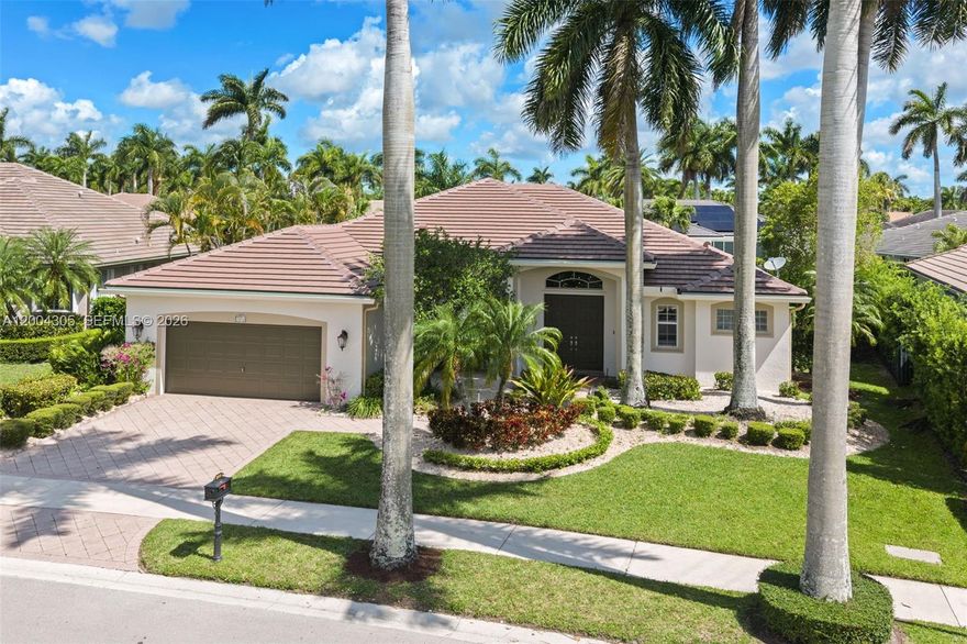 Welcome to an exceptional opportunity within the prestigious Weston Hills Country Club. This impeccably maintained one-story residence perfectly blends modern elegance with effortless South Florida living all on an 11,656 sq ft lot. From the moment you enter, you’re greeted by a bright, open ambiance enhanced by contemporary light fixtures and an intelligently designed split floor plan that offers both privacy and functionality. At the heart of the home lies a stunning modern kitchen, thoughtfully appointed with premium Thermador appliances and striking quartz countertops—ideal for both everyday living and upscale entertaining. The spacious layout flows seamlessly into expansive living areas, all bathed in natural light. Retreat to generously sized bedrooms, including a luxurious primary suite with direct access to the pool area, creating a true indoor-outdoor lifestyle. Step outside to your private oasis featuring a large pool enclosed within a screened patio, complemented by a convenient cabana bath—perfect for hosting or relaxing in total comfort. With a newer 2024 roof and 2024 AC unit, this home offers peace of mind alongside its undeniable style. Located just minutes from all the premier amenities, dining, shopping, and top-rated schools that the Weston lifestyle is known for, this property is more than a home—it’s a statement of refined living in one of South Florida’s most desirable golf communities.