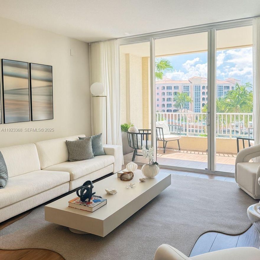 This fully remodeled 3-bedroom residence at Resort Villa 2 offers an elevated lifestyle within the Ocean Club. The entire apartment features new flooring, a fully redesigned master bathroom with three windows that bring exceptional natural light, and new air conditioning systems. All appliances were updated. Each of the three bedrooms includes a walk-in closet with custom cabinetry. The U-shaped open concept kitchen integrates beautifully with the living area and features an illuminated counter designed for small appliances. The home is delivered fully furnished with high-quality pieces. The master bedroom, living room and terrace face the pool and the lake, offering peaceful and inspiring views. The residence includes 2 assigned parking spaces. One is an indoor space conveniently located directly in front of the elevator and equipped with an electrical outlet. The second is an outdoor assigned space located in front of the garage gate. Additional conveniences include a private storage unit and a bicycle area. This residence is one of a kind due to its renovation level, rare bathroom windows, open kitchen design, natural light and its privileged position within the Ocean Club. Please note that the home is fully furnished although small appliances and housewares are not included.