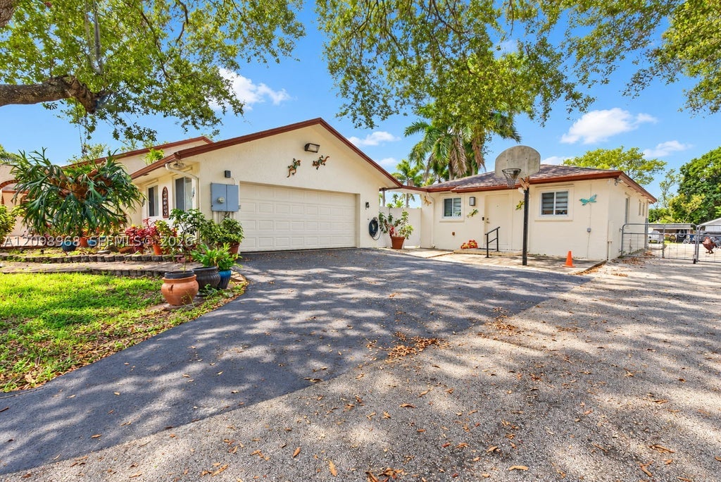 Photo of 16110 Stirling Rd, Southwest Ranches, FL 33331 (MLS # A12098968)