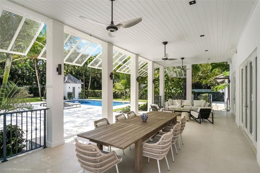 Welcome to your exclusive & privately gated estate on a sprawling 49,223 sq ft lot in Ponce Davis. Renovated in 2021, this 8 bed/8.5 bath, 6,936 sq ft makes for a stunning home. First level features living room w/ abundant natural lighting, formal dining room, office, family room, tv room, guest bedrooms, 2 staff quarter, playroom, gym & 5 car carport. Chef's kitchen boasts Wolf and Subzero appliances. Soaring ceilings throughout.  
Second level offers 4 ensuite bedrooms, lavish primary suite w/ 2 walk-in closets, spa bath w/ tub, shower &sauna. Backyard is an entertainer’s paradise, featuring a temperature-controlled pool, brand-new steam cabana, basketball court, & BBQ area.2025 impact windows, Control 4 smart home system+ security cameras, Lutron lighting, & backup generator