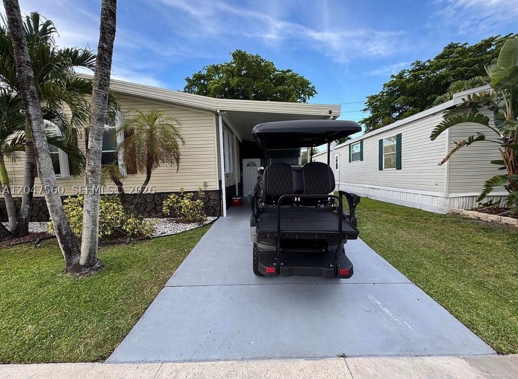 Photo of 1196 SW 112th Way, Davie, FL 33325 (MLS # A12047560)