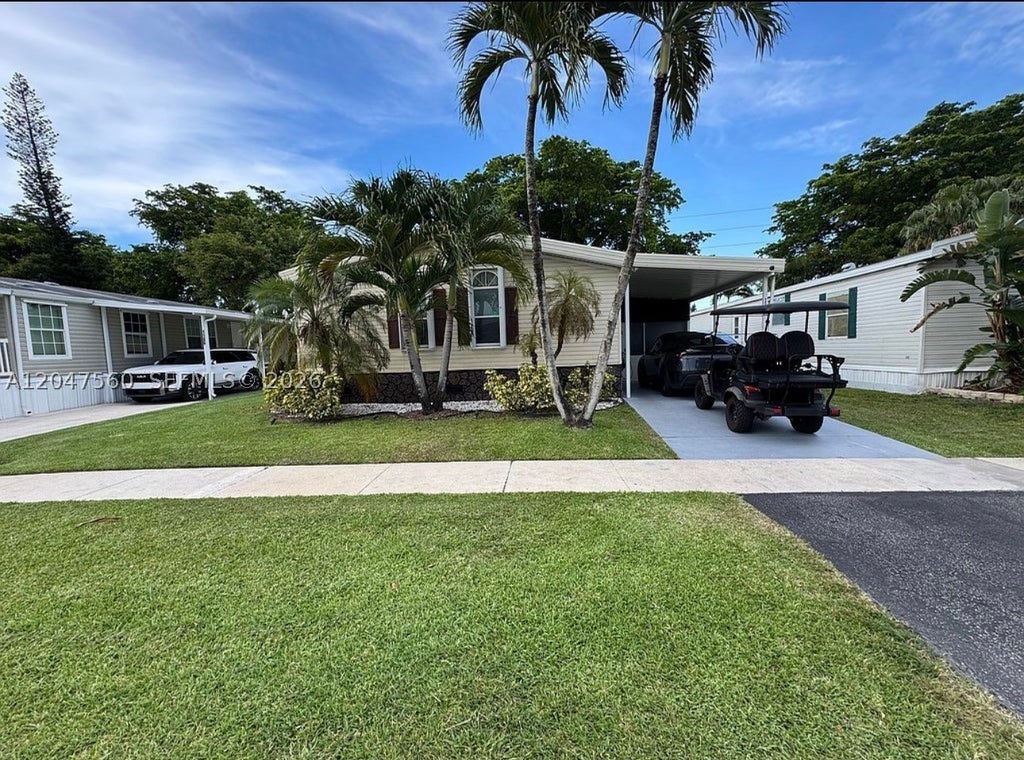 Photo of 1196 SW 112th Way, Davie, FL 33325 (MLS # A12047560)