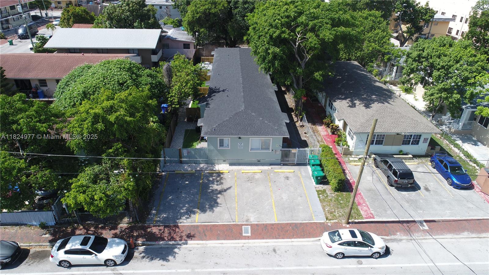 Turnkey fourplex in the heart of Little Havana, just one block from the iconic Calle Ocho tourist corridor. This fully renovated property features four 2-bedroom, 1-bathroom units—each with central A/C, modern kitchens with new cabinets and appliances, and fully remodeled bathrooms. Every unit includes a private outdoor patio space, offering tenants a rare combination of privacy and comfort.
The building has completed its 40-year recertification, giving buyers added peace of mind. Onsite laundry provides additional income, and trash is included in the property taxes, helping reduce operating expenses. Whether for long-term tenants or short-term rental potential, this property is ideally positioned in one of Miami’s most vibrant and high-demand neighborhoods.