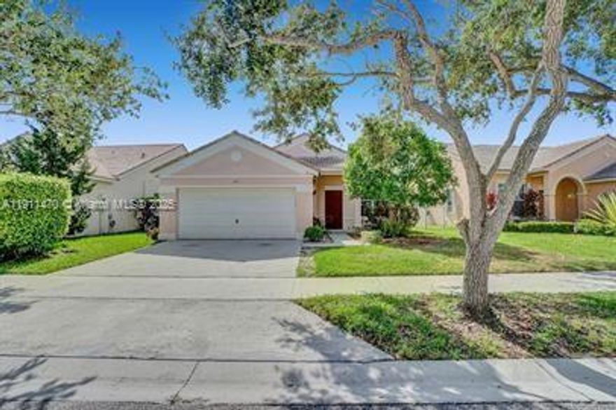 Beautiful 3/2 single family home centrally located in Weston. The property features recently remodel kitchen and bathrooms, hardwood floors, washer and dryer inside the unit, screened patio and fenced in large backyard. These gated community offers great amenities and lots walking paths. Excellent neighborhood, A+ rated schools.