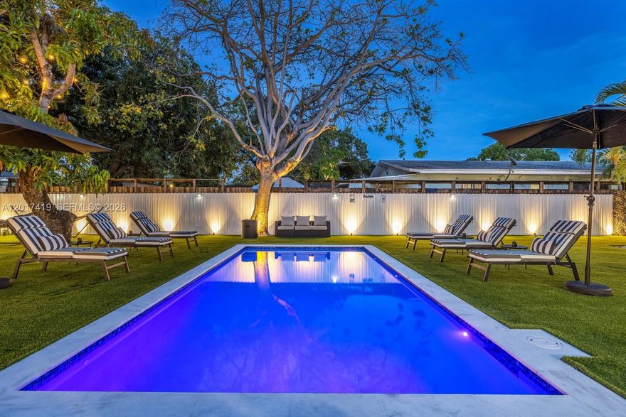 Welcome to CasaMia — a fully renovated, turnkey investment property in Miami offering two independent living spaces on one lot, generating $118,000 in gross revenue over the last 12 months.
The main house features two bedrooms and two bathrooms, extensively renovated from top to bottom. Highlights include a full electrical upgrade, impact doors throughout, fully remodelled kitchen with modern finishes, and two beautifully updated bathrooms. Spanish tile flooring runs throughout, giving the home a clean, contemporary feel. Every detail has been addressed — this is real renovation, not cosmetic.
Step outside and into your own private resort. A brand new permitted 12x24 saltwater pool sits at the heart of the backyard, surrounded by artificial turf, an outdoor dining area, hammocks, fire pit, and automatic perimeter lighting. The electric driveway gate and fully fenced perimeter complete the picture.
On the side of the property sits a completely independent studio — private gated entrance, its own kitchenette, bathroom, washer/dryer, and air conditioning. Zero shared space. Two units. Total privacy.
The flexibility here is the story. Live in the main house and rent the studio. Or use the entire property as a luxury short-term rental.
Fully furnished. Fully operational. Ready from day one.