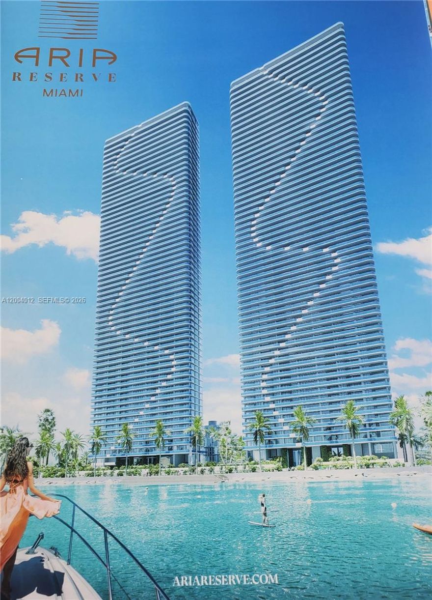 Spectacular amenities include a private sports marina for paddle boarding and kite kayaking, a three swimming pool two of them overlooking the water. Amazing fitness center, wellness spa, kids' playground, wine lounge, state-of-the-art library, party room, lap pool, tennis and paddleball courts, half-court basketball, and mini golf The open-concept layout features a sleek gourmet kitchen with top-of-the-line appliances . Video and floor plan available upon request.