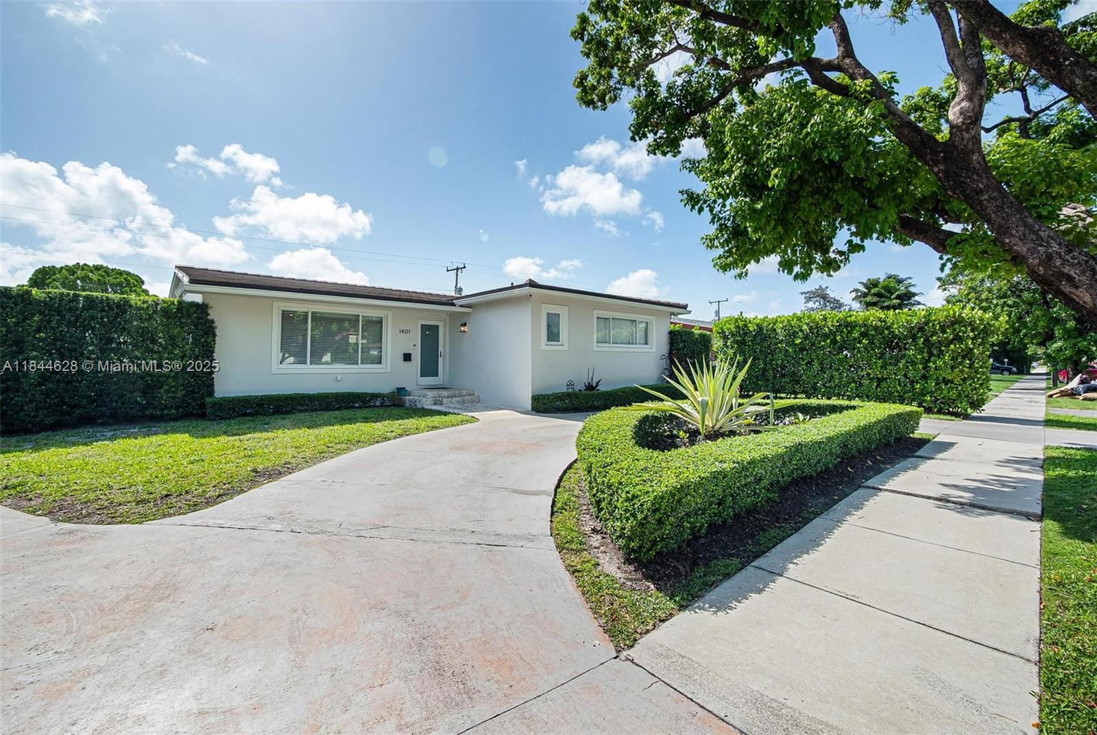 Charming Westchester Corner Lot Home w/ Pool & Spa! Updated home on a spacious lot with lush landscaping and wide driveway. Features open-concept living/dining with access to kitchen, south wing with all bedrooms including a large primary suite, and a rear family room leading to laundry/utility area. Enjoy a brand-new patio, sparkling pool with spa, and plenty of yard space for kids or pets. Upgrades: 2017 roof, 2022 electric panel, 2017 PGT impact windows/doors. Turnkey and perfect for entertaining!