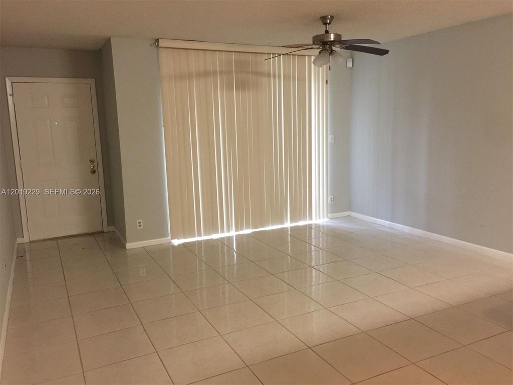 Photo of 841 Lyons Rd #24201, Coconut Creek, FL 33063 (MLS # A12019229)