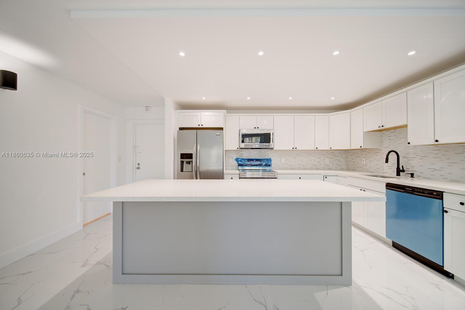 ONLY 2 MONTHS REQUIRED FOR MOVE IN (First month and Security Deposit)!! COMPLETELY REMODELED! Located on FIRST FLOOR. 2 Bed 2 Bath. Featuring white kitchen cabinets, huge kitchen island with a quartz top, stainless steel appliances, spacious living areas, tiled floors, brand new remodeled bathrooms, washer/dryer inside the unit. One assigned parking spot, plenty of guest parking. Water and sewer included in rent. Association also requires a $500 security deposit.