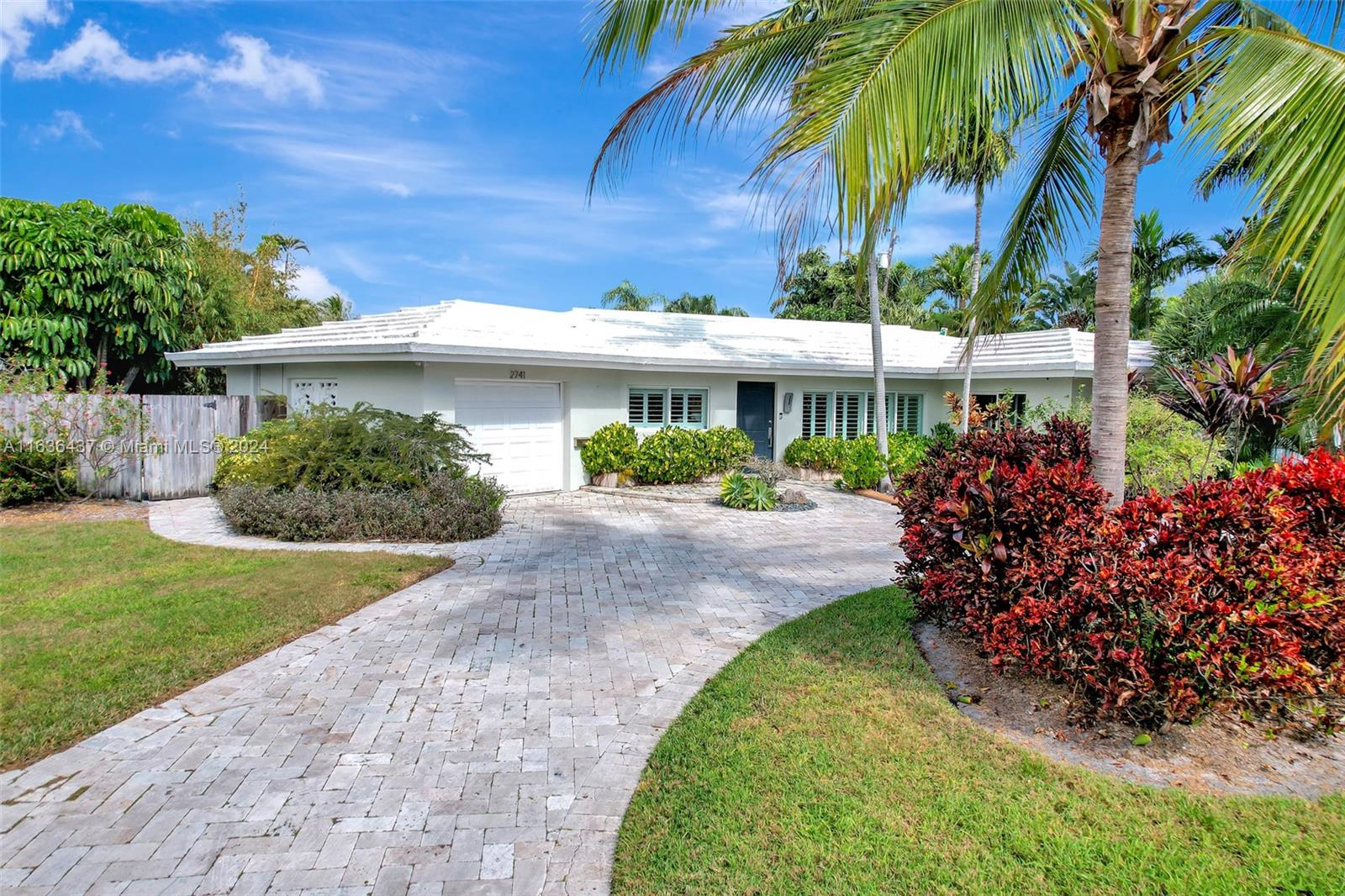 ONE-STORY HOME WITH WITH A POOL IN THE HIGHLY DESIRABLE NEIGHBORHOOD OF CORAL RIDGE! WITH GREAT OPEN SPACES FOR ENTERTAINMENT, BOTH INDOORS AND OUTDOORS, THE HOME FEATURES 3 EN-SUITE BEDROOMS + A FULL BATH FOR GUESTS. THE SUBSTANTIALLY REMODELED KITCHEN HAS GRANITE COUNTERTOPS AND STAINLESS STEEL APPLIANCES. ADDITIONAL UPGRADES INCLUDE MARBLE FLOORING THROUGHOUT, ALL HURRICANE IMPACT WINDOWS AND DOORS, PLANTATION SHUTTERS, REMODELED BATHROOMS, 1 CAR GARAGE, CIRCULAR DRIVEWAY, AND A VERY PRIVATE OUTDOOR OASIS WITH POOL. JUST A FEW MINUTES TO THE BEACH, NEAR GREAT SHOPPING AND DINING, WITH CLOSE PROXIMITY TO THE LIVELY WILTON MANORS AND DOWNTOWN FORT LAUDERDALE/LAS OLAS AREA. CENTRALLY LOCATED NEAR MAJOR HIGHWAYS AND THE FORT LAUDERDALE AIRPORT.
