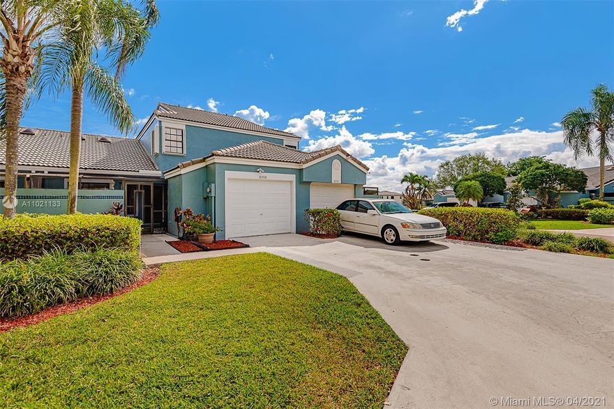 Exquisitely upgraded 3 bedrooms 2.5 baths in the desirable Woodmont neighborhood in Tamarac. Open floor plan kitchen with generous room for large gatherings or unwind in the tranquil screened patio with spectacular water & golf views. Vaulted ceilings with skylights emphasize the airy, spacious interior. Recently updated bathrooms and flooring throughout. Oversized bedrooms, each with walk-in closets, in a split floor plan with the master on the main for your privacy. HVAC includes an ionizer. This home is ideally located close to shops & malls with highway access. The refrigerator in the garage conveys. Association requires at least 5% down and DTI of 40% or less.