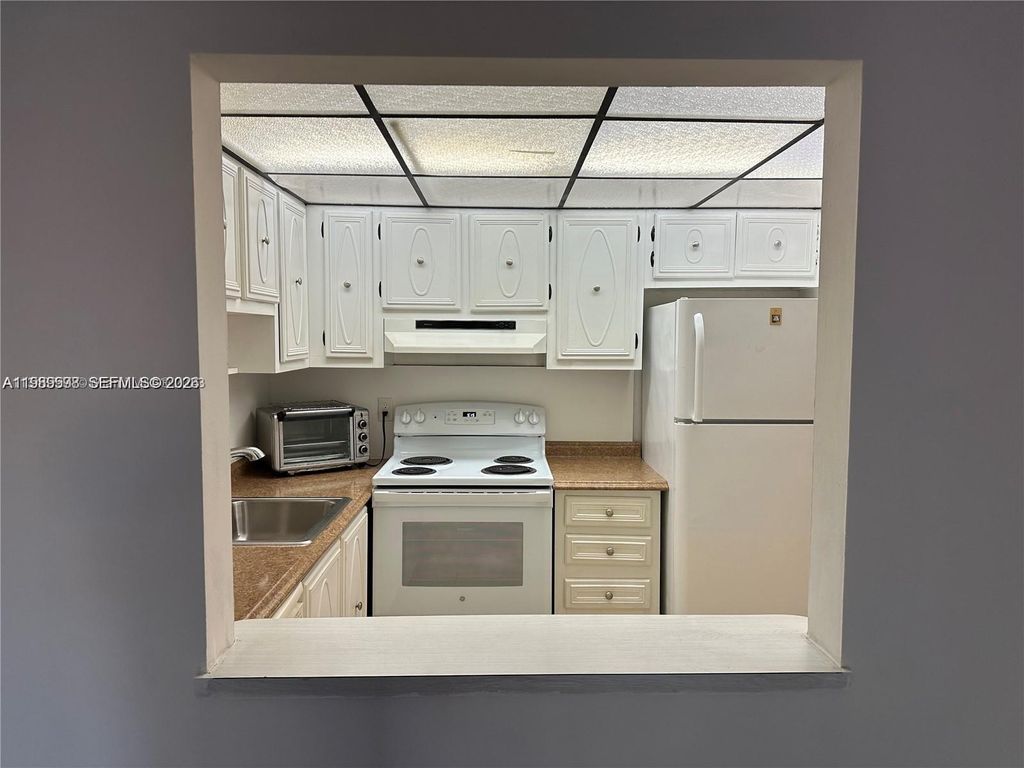 Photo of 253 S Cypress Rd #214, Pompano Beach, FL 33060 (MLS # A11989598)