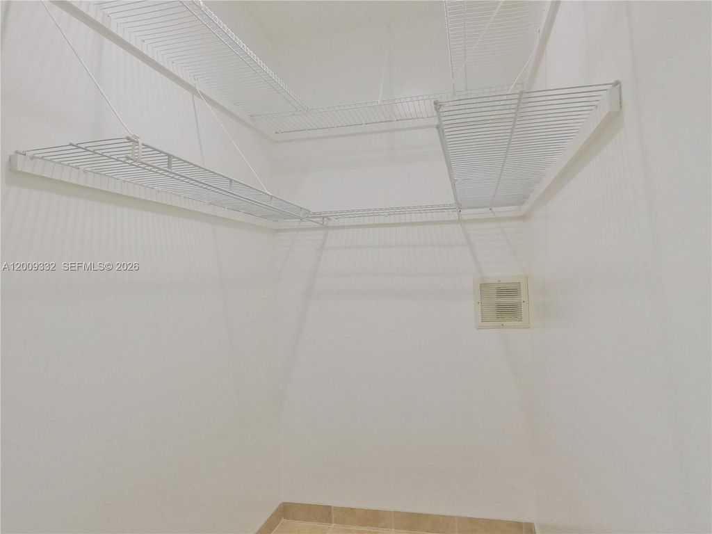 Photo of 1021 Mango Dr #B, West Palm Beach, FL 33415 (MLS # A12009332)