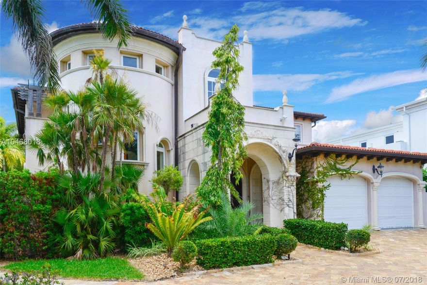 BOAT OWNER'S DREAM!!! Unique custom built canal front home. Beautiful 6 BEDROOM/6,5 BATHROOM, Mediterranean house on the canal with  mosaic pool and a 75 foot dock on the water. Two story with spacious roof patio and  billiard room.  Marbled floor throughout first floor, fireplace in the living room, formal dining room, open kitchen and family room. Two car garage.