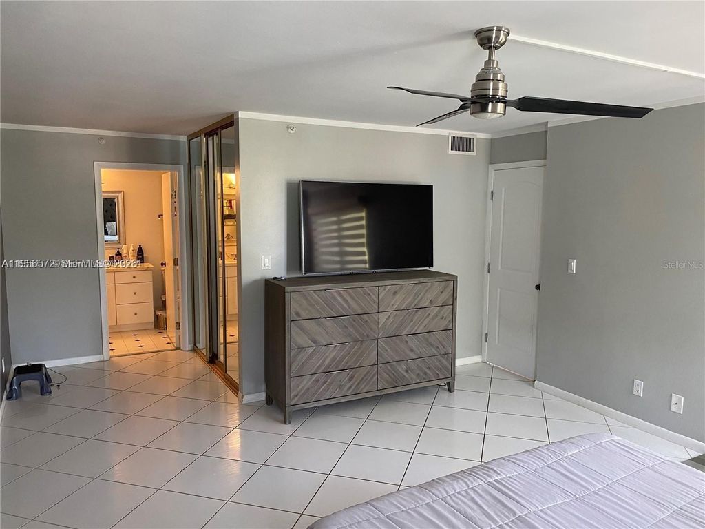 Photo of 2205 S Cypress Bend Dr, Dr #302, Pompano Beach, FL 33069 (MLS # A11956572)