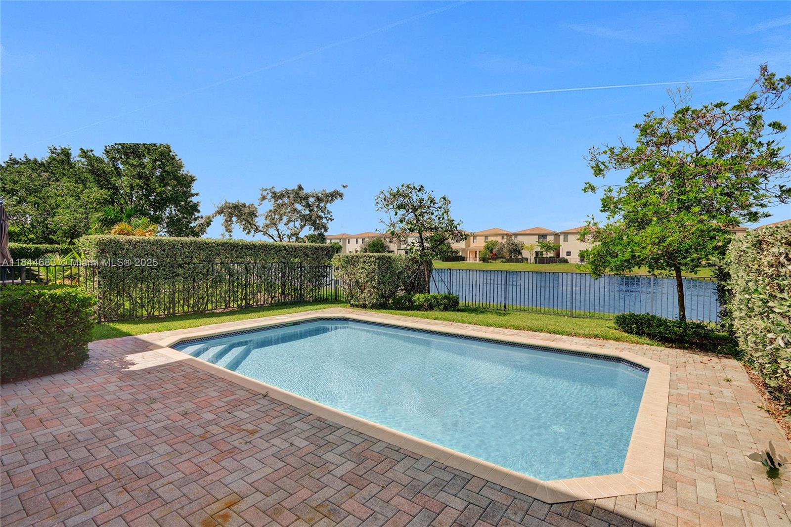 SPECTACULAR LAKEFRONT HOUSE WITH POOL 4BEDS 2 1/2 BTHS & 2 CAR GARAGE! IN THE DESIRABLE GATED COMMUNITY "AVENTURA ISLES" BEAUTIFUL OPEN FLOOR PLAN WITH A NICE OPEN KITCHEN WITH GRANITE COUNTERTOPS, STAINLESS STEEL APPLIANCES. LIVING ROOM AND KITCHEN OVERLOOKING THE MAGNIFICENT VIEWS OF THE POOL AND LAKE. LAMINATE WOOD FLOORS AND TILE THROUGHOUT. LARGE BEDROOMS WITH LOTS OF CLOSETS SPACE. GATED COMMUNITY WITH LOTS OF AMENITIES, TENNIS COURTS, COMMUNITY POOL, PLAYGROUND AND MORE..! MAINTENANCE INCLUDES; CABLE, INTERNET, SECURITY, LAWN AND ALL AMENITIES ***EASY TO SHOW***FOR SHOWING INSTRUCTIONS SEE BROKERS REMARKS***
