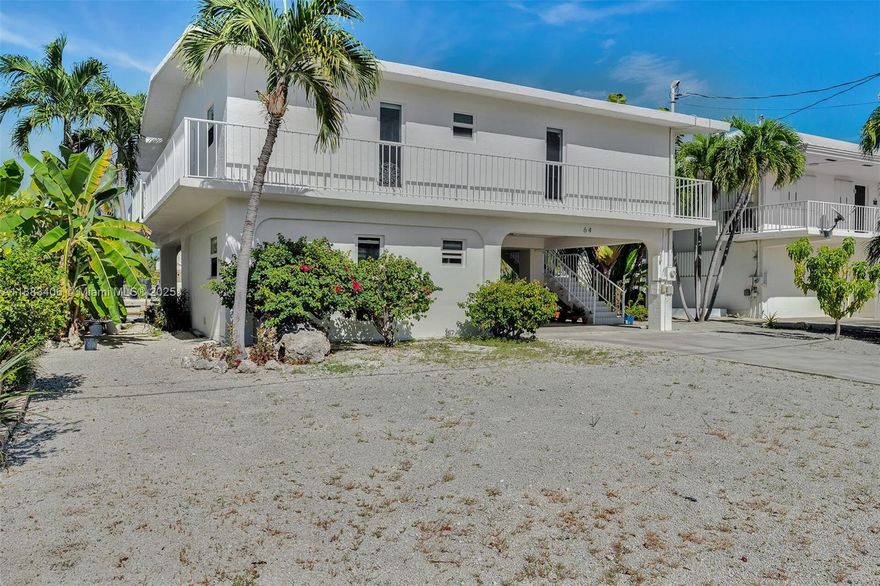 Beautifully updated coastal home in the prestigious private beach community of Port Antigua, Islamorada. This move-in-ready home is the best value currently available in one of the most sought-after neighborhoods, offering unmatched tranquility and access to one of the finest private sandy beach communities in the Keys. Thoughtfully renovated interior featuring an open-concept layout, modern finishes, and impact-resistant windows and doors throughout, providing peace of mind and storm protection. The bright living space seamlessly transitions into a stylish kitchen featuring quartz countertops, stainless steel appliances, and modern cabinets—ideal for relaxed entertaining. The outdoor covered space offers ample room for lounging, grilling, or simply enjoying the laid-back Keys lifestyle.