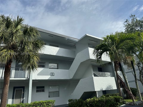 Photo of 8370 Sands Point Blvd #H309, Tamarac, FL 33321 (MLS # A12099594)